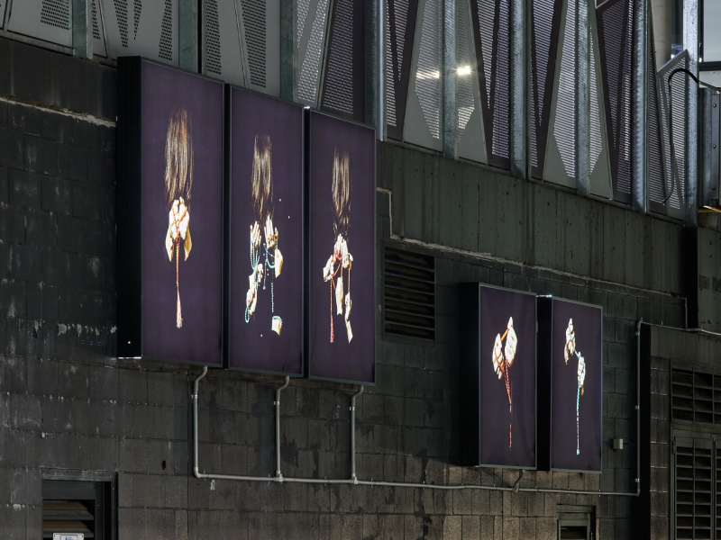Photo of '33 Beads' by Nasim Nasr on display at the Laneway lightbox Open-air Gallery